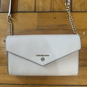 Michael kors white wallet bag with strap. Used once